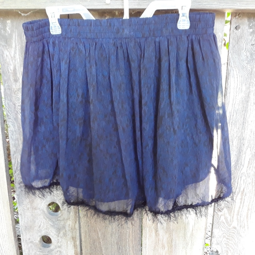 Blue and black converse skirt size large.